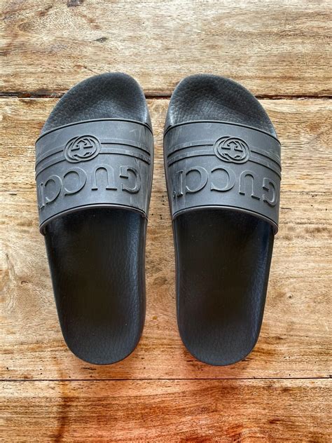 pursuit gucci logo rubber slide sandal|Gucci lido slide sandals.